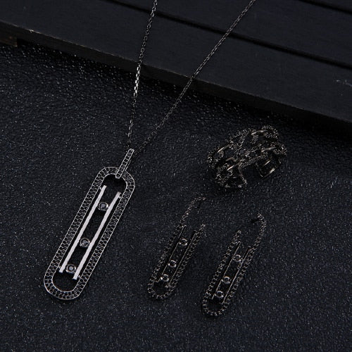 Women’s black diamond necklace, earrings and ring set