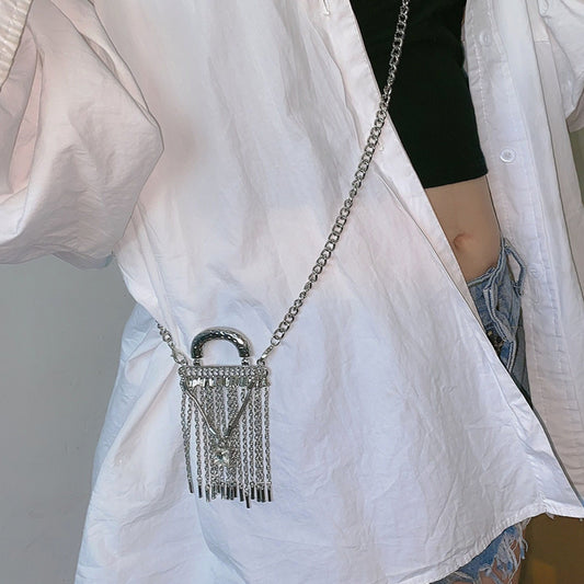 Women’s silver tassel purse