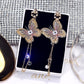 Pink furry butterfly earrings
